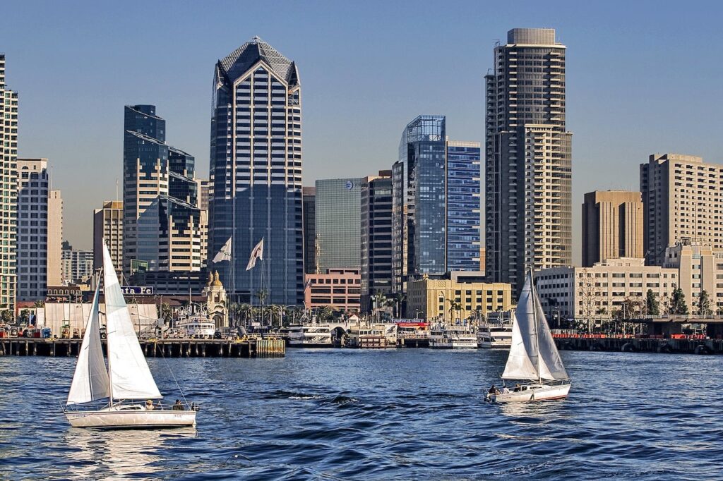 san diego skyline from the water with sailboats